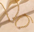 Set dorado con perla natural