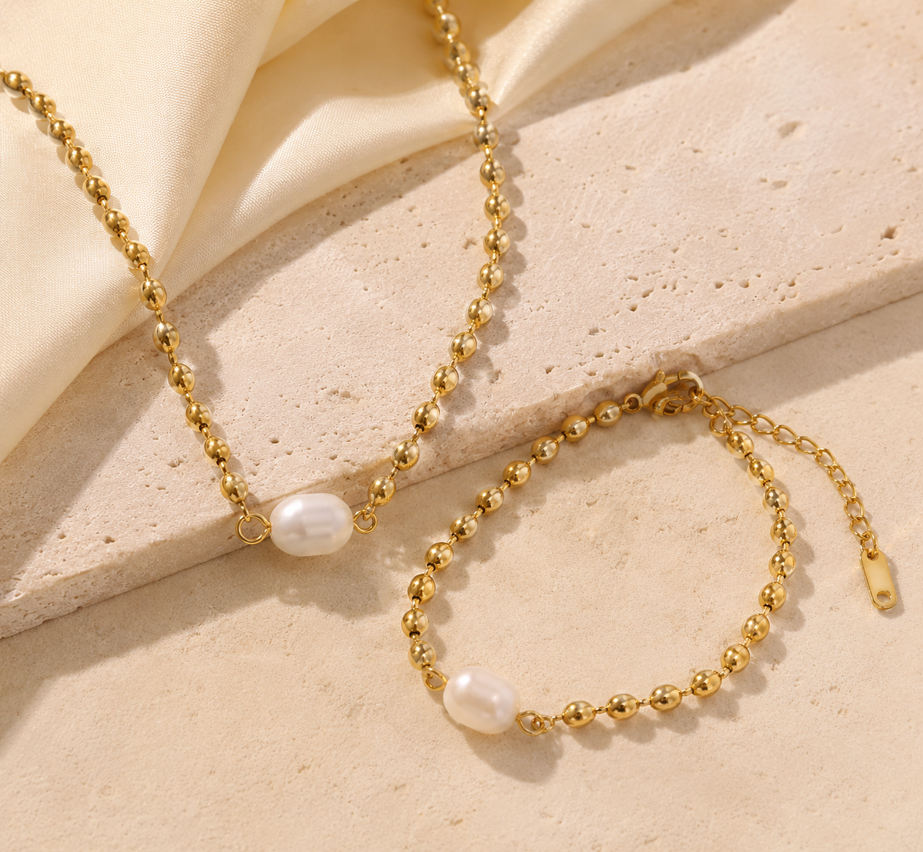 Set dorado con perla natural